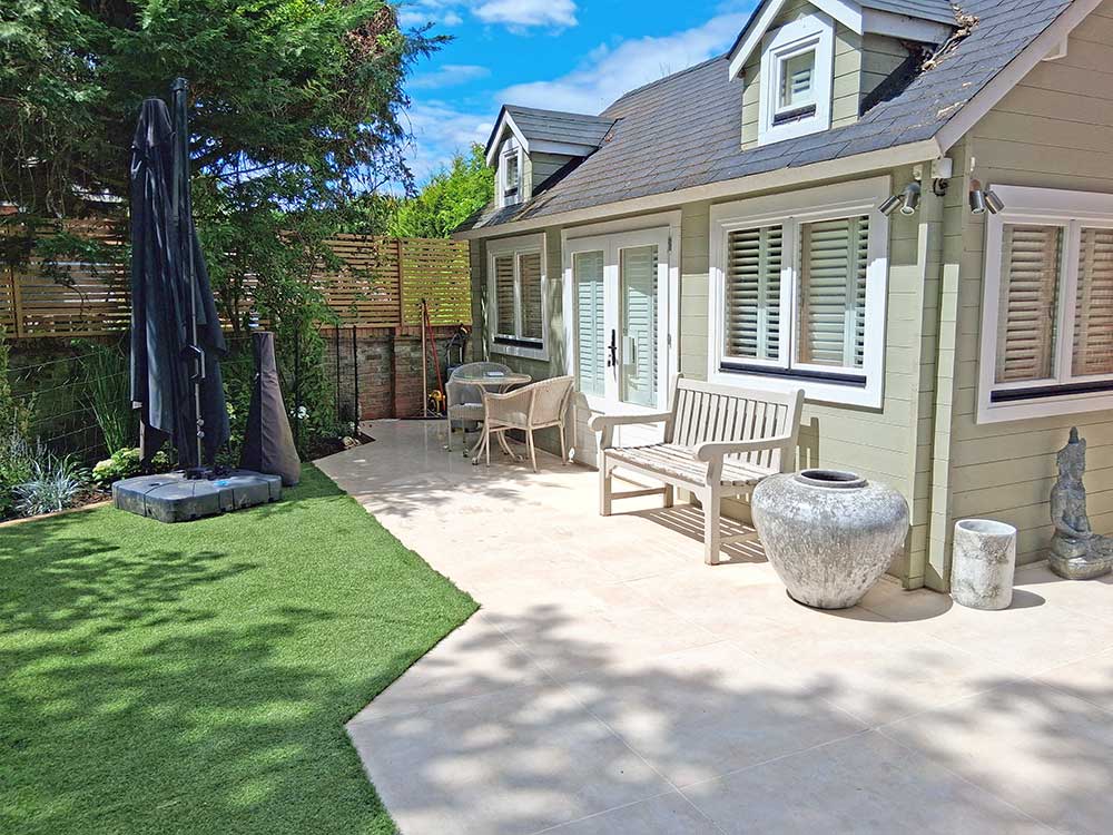 Side of rear-garden with new paving