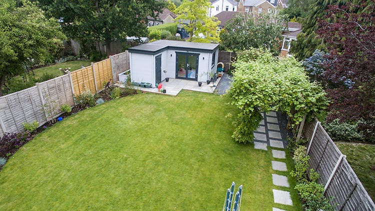 Rear-garden featuring new storage and outside room