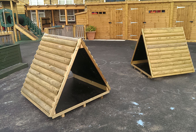 Bespoke wooden play equipment designed and installed by Boardman Gelly