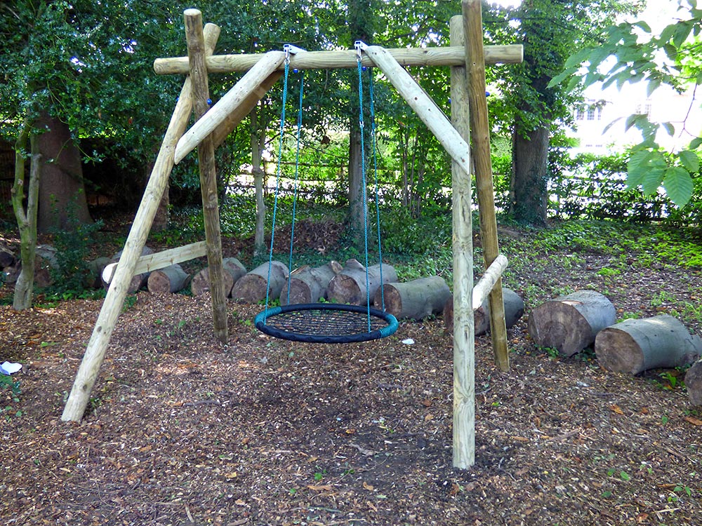 Children’s play area with large swing